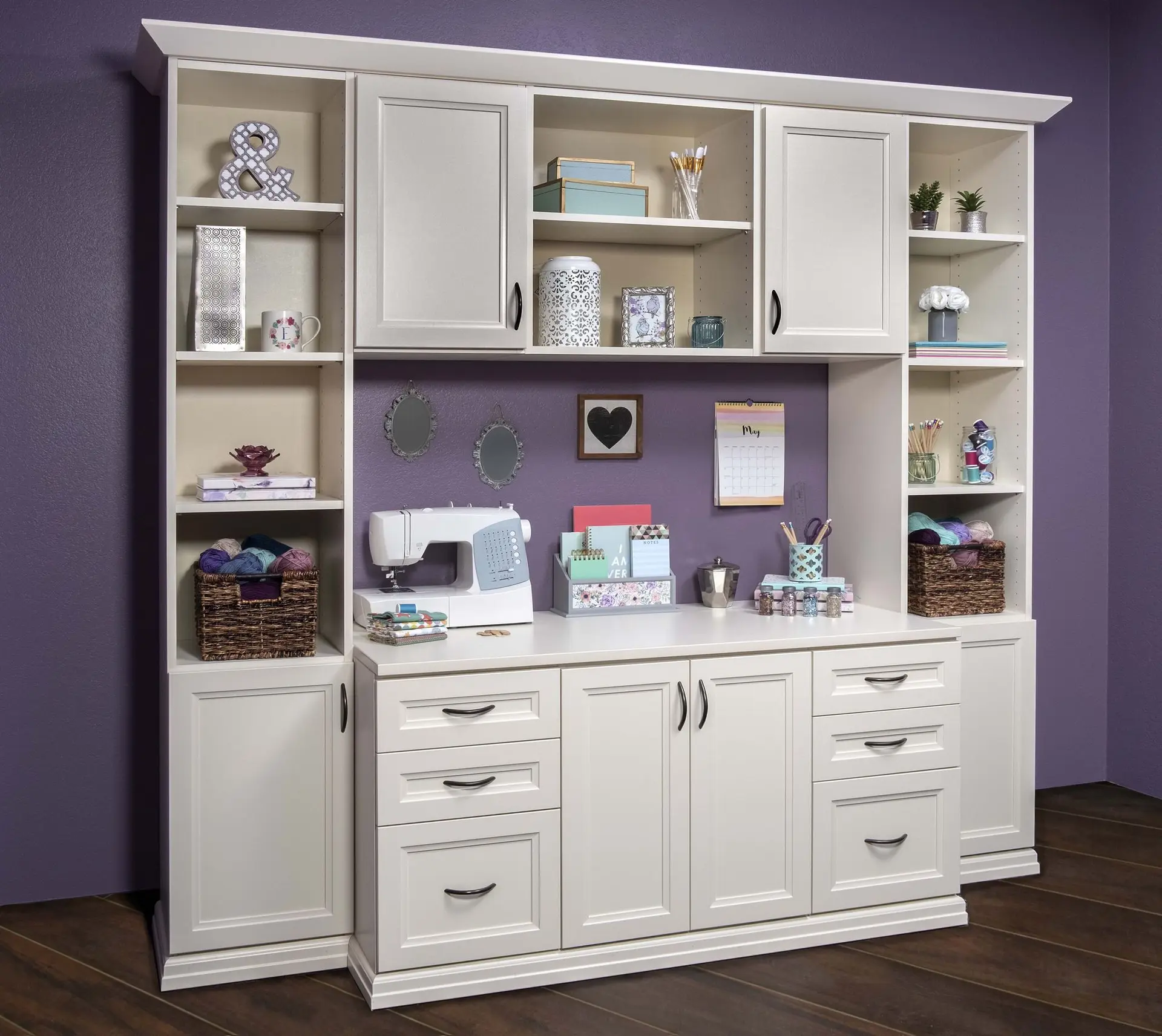 Custom craft room storage cabinets and built-in hobby shelving organizers by Closets Beyond