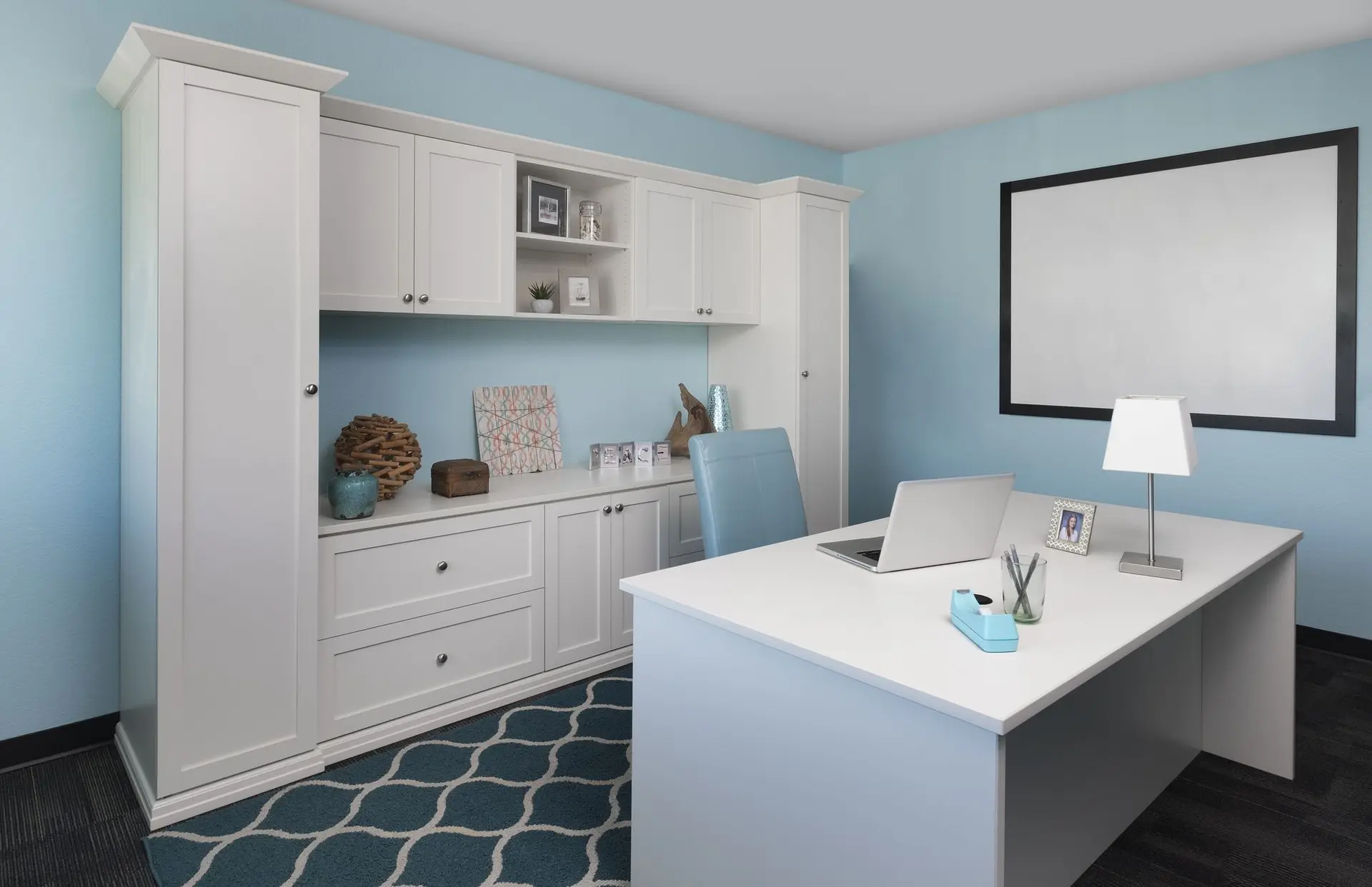 Custom antique white built in home office desk and cabinetry in Coral Springs