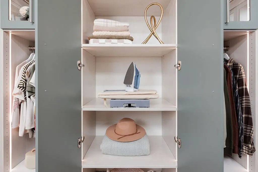 Custom closet organizer shelving with open storage in a luxury South Florida home