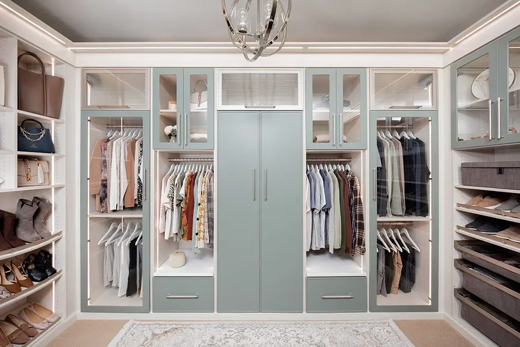 Arctic and Spruce custom closets Broward County FL installation with sleek green cabinetry