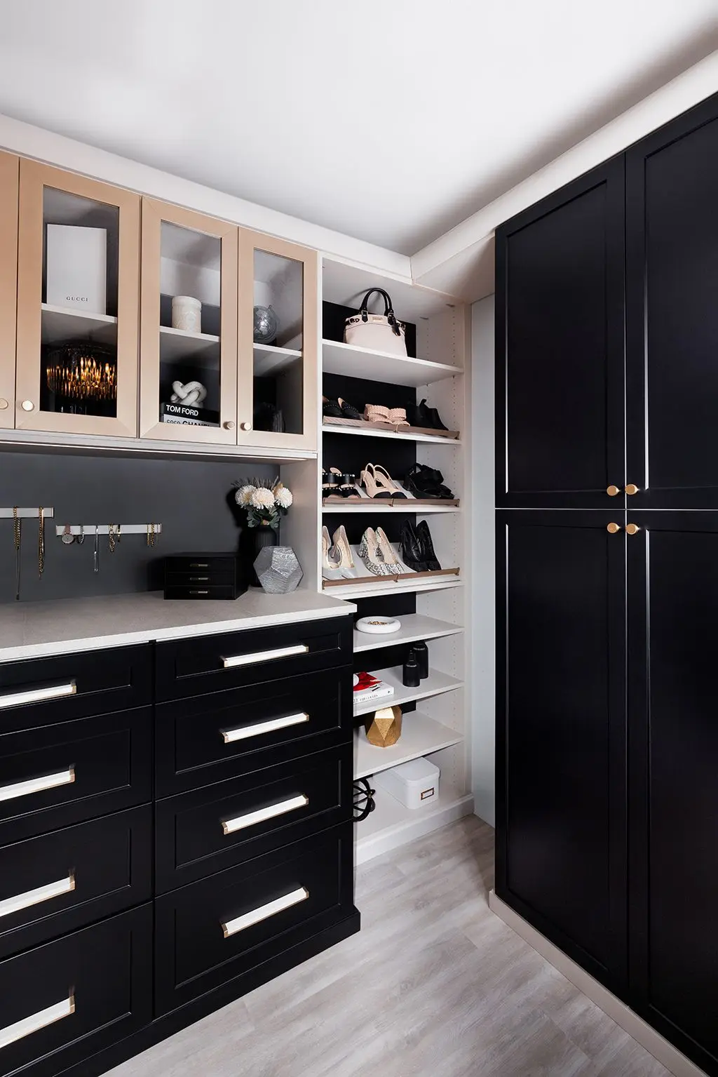 Elegant vintage custom closet systems maximizing master suite wardrobe storage in Parkland