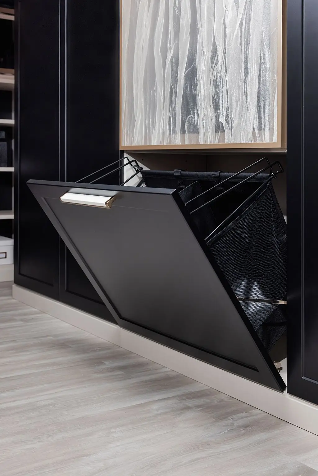 Sophisticated black walk in closet organizer layout built by a South Florida contractor
