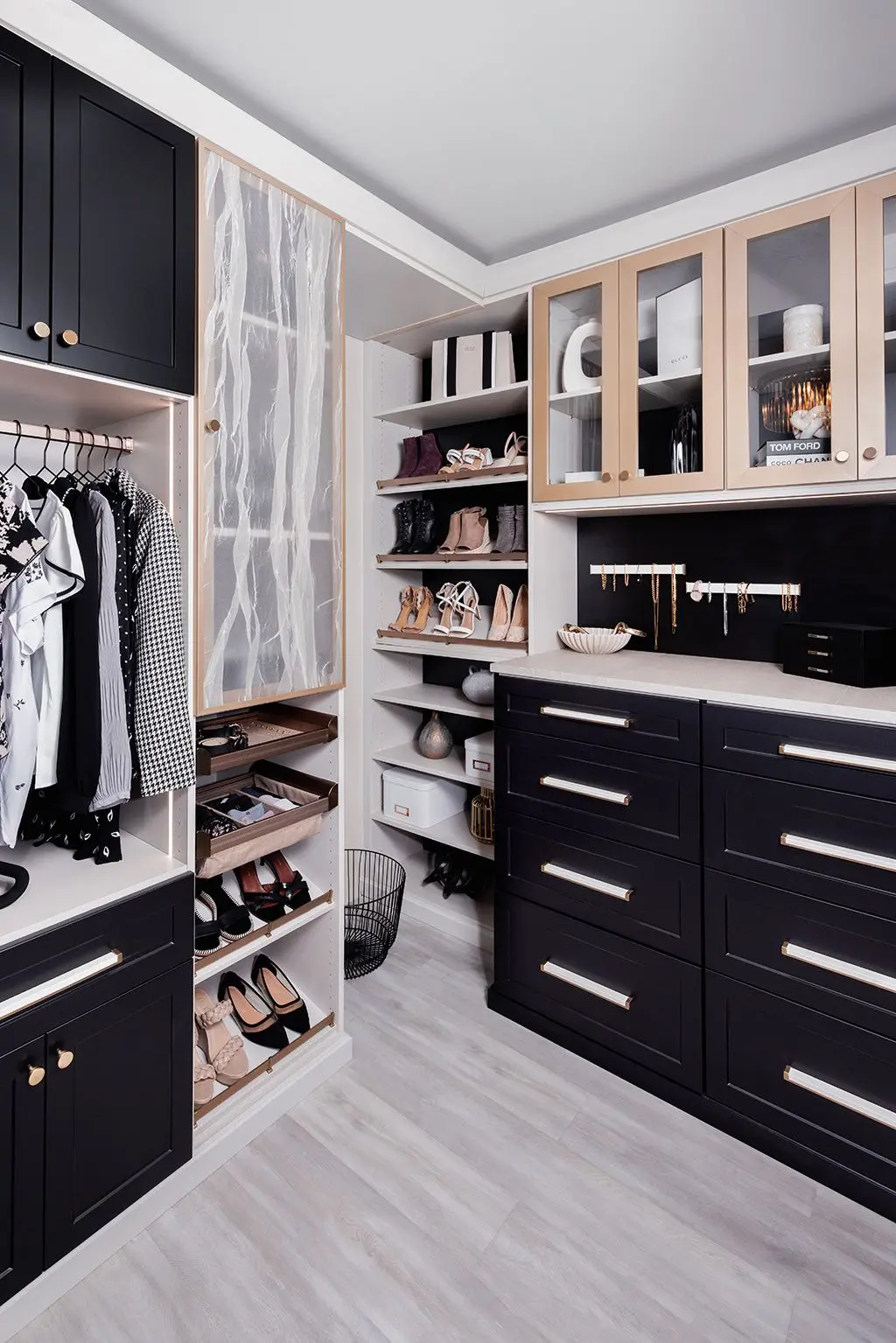 Modern dark wood custom home storage cabinetry installed for a bedroom in Boca Raton