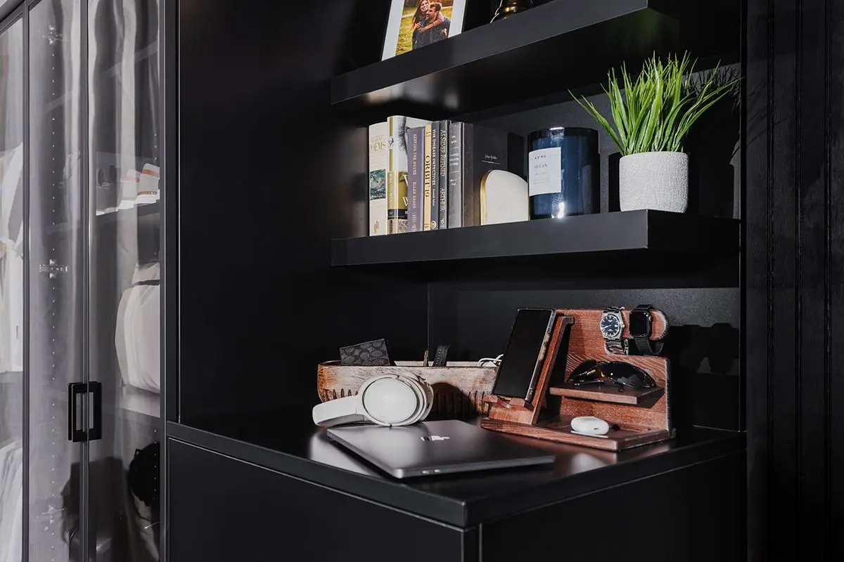 Modern black closet storage units with open shelving display for home decor