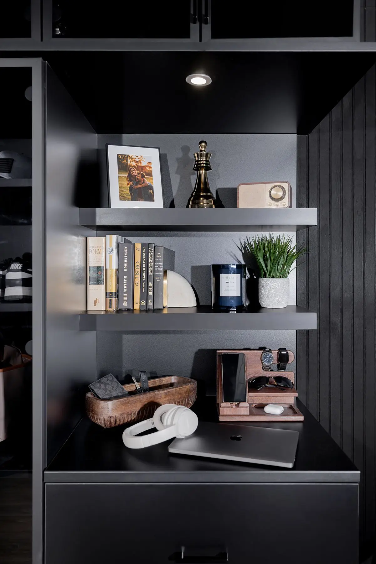 Sleek black custom wardrobe storage and built in bedroom cabinetry in Weston