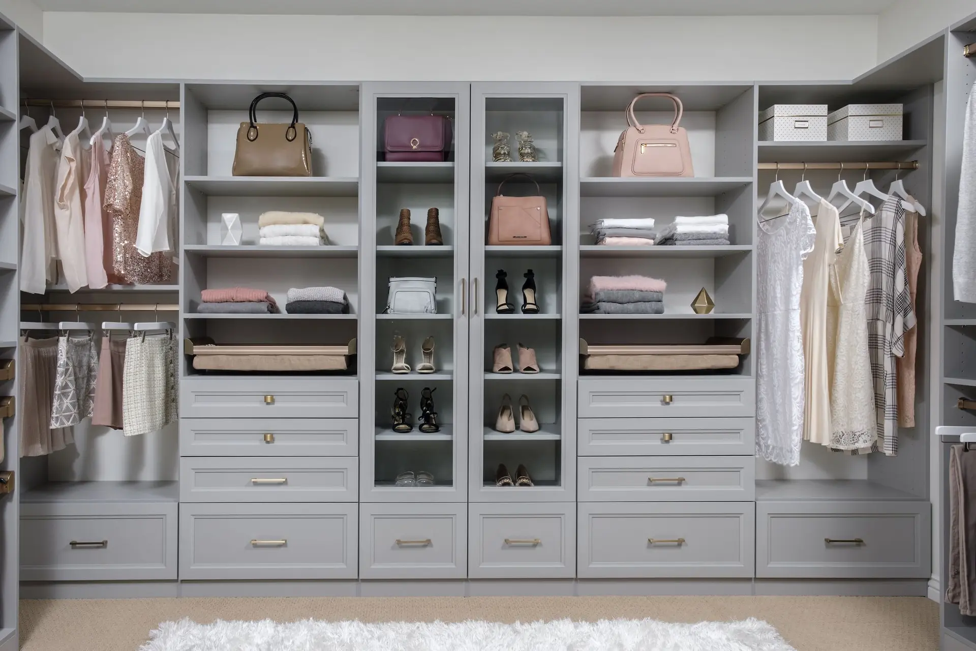 Bespoke boutique closet organizer system maximizing master bedroom storage in Coral Springs