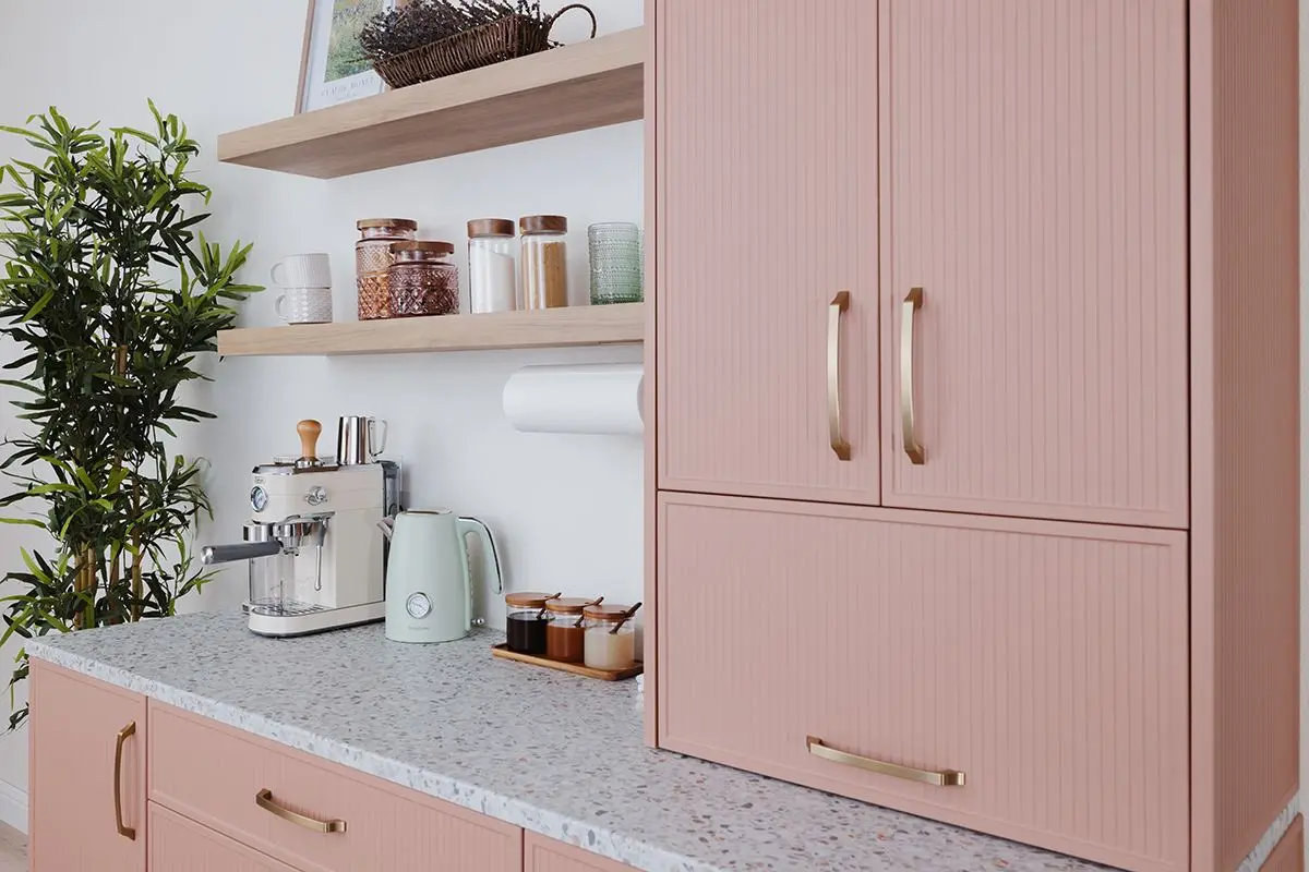Custom built in coffee bar station showcasing sleek under cabinet lighting accents