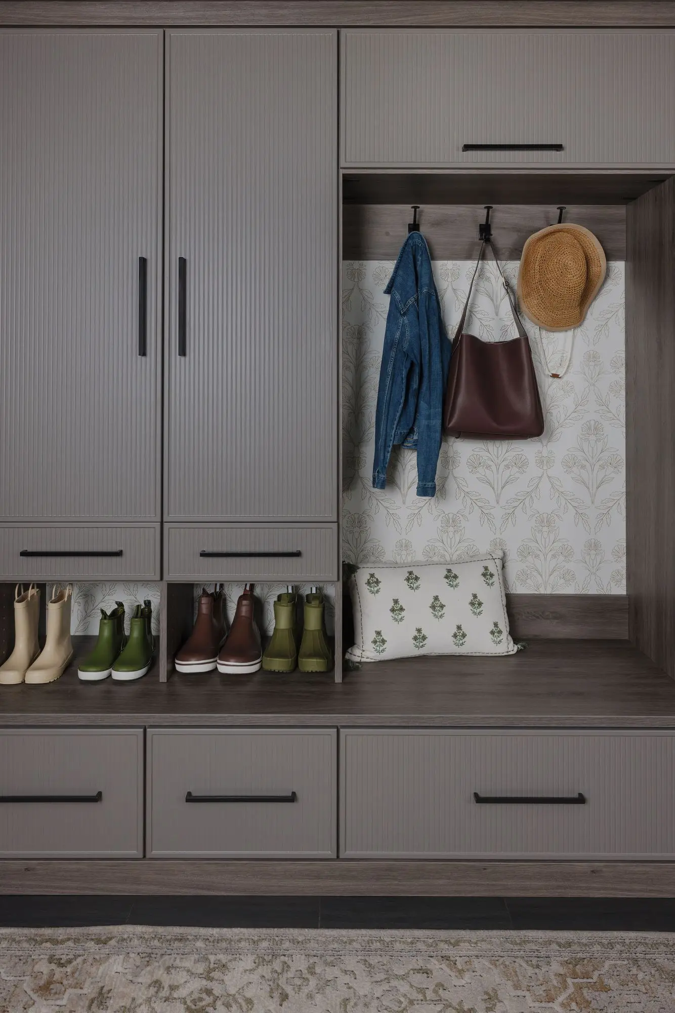 Modern entryway mudroom cabinetry near me featuring custom hanging garment hooks