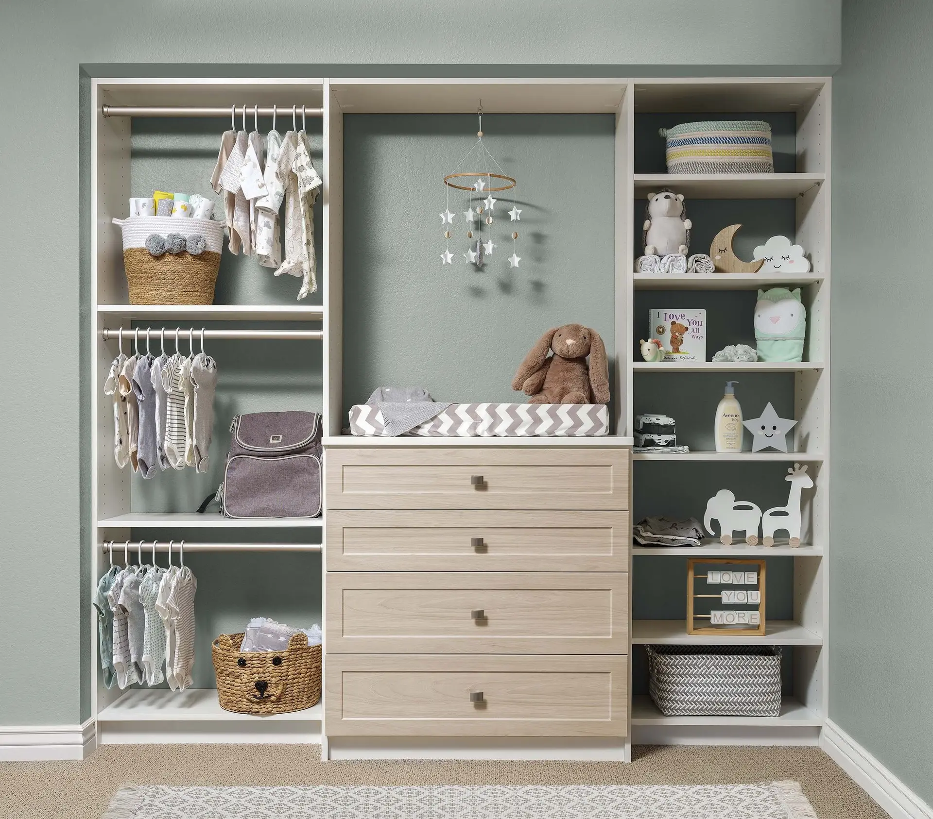Custom wood grain kids closet organizer with built in drawers and double hanging rods