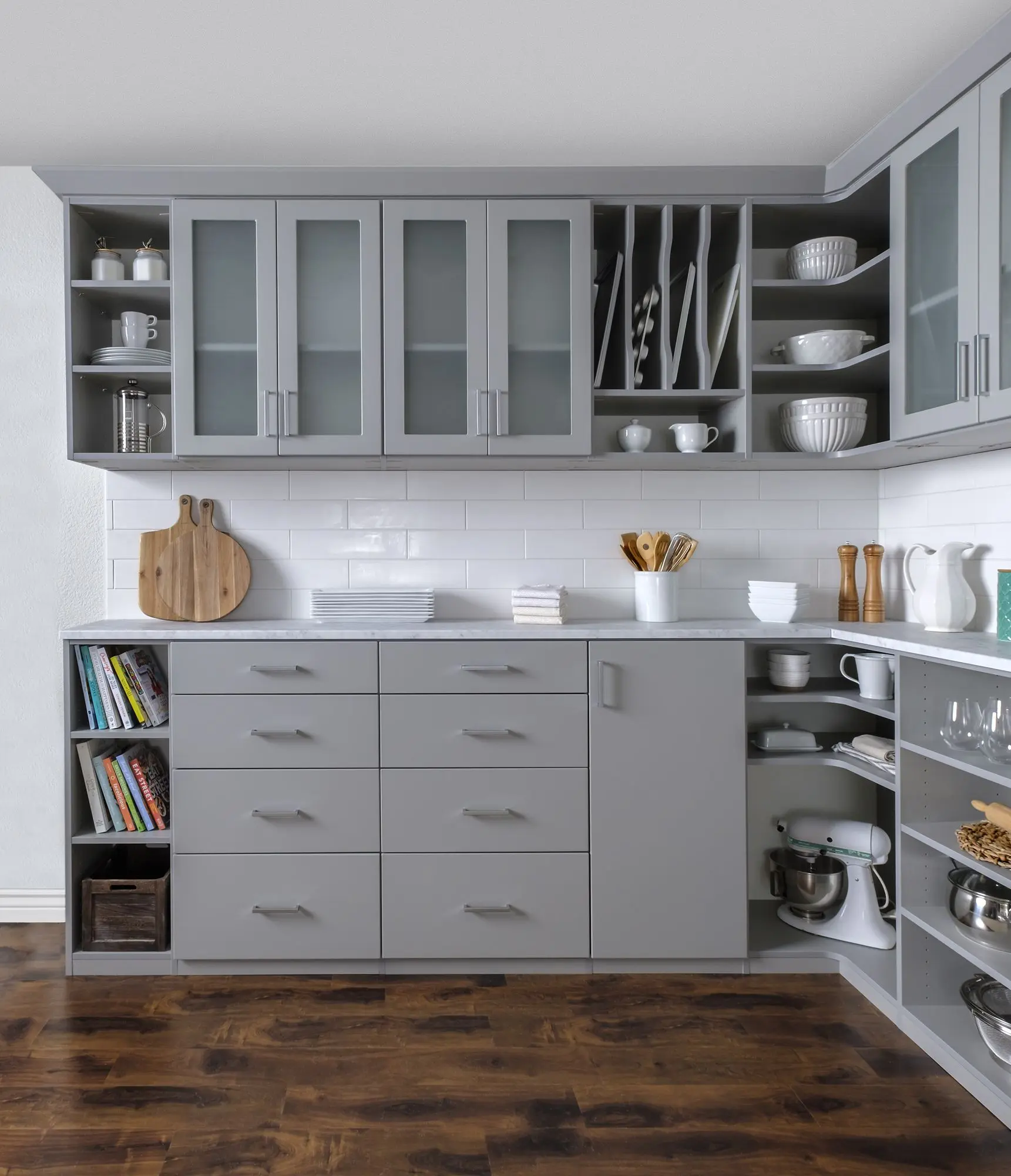 Modern kitchen pantry storage systems near me featuring deep organization drawers and corner shelves