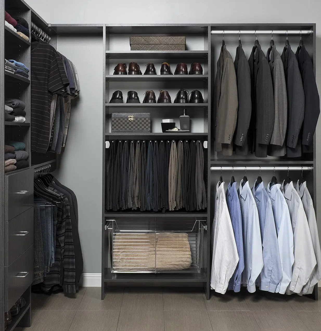 Modern master bedroom walk-in wardrobe layout featuring dark premium laminate drawers