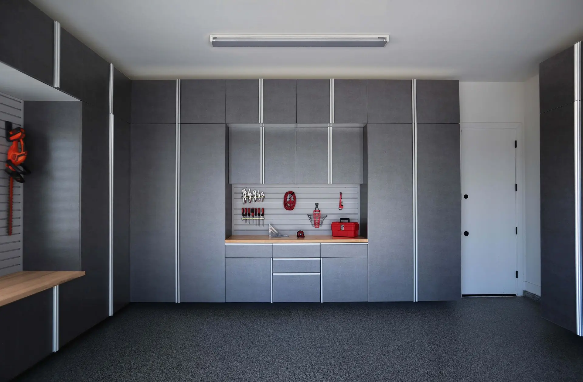 Sleek custom pewter garage storage cabinets installed in Deerfield Beach
