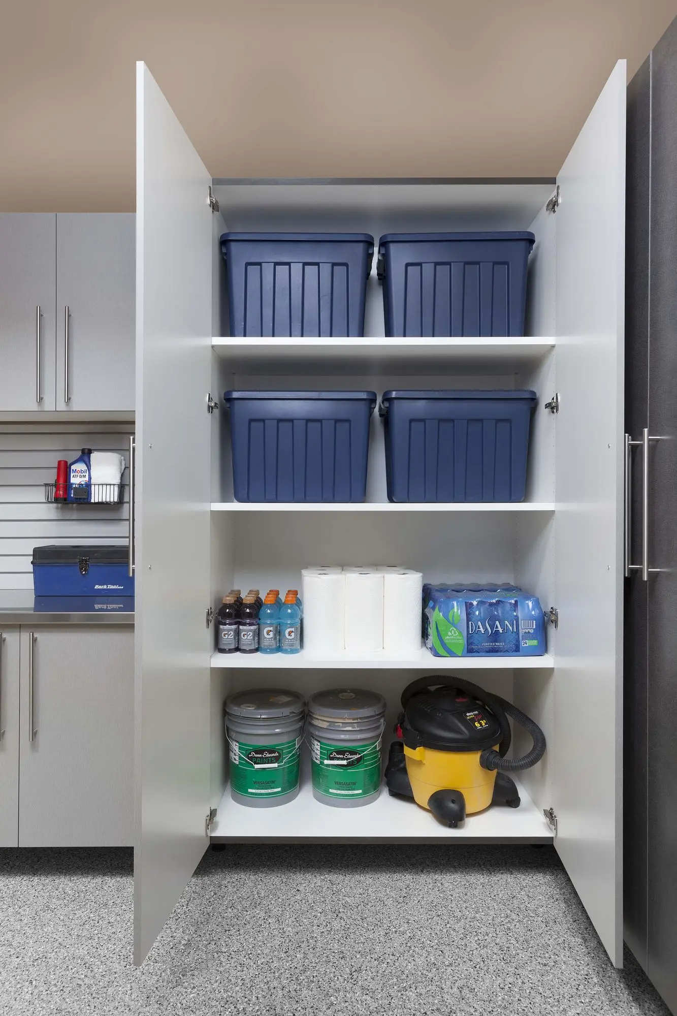 Interior shelving view of tall silver garage storage cabinets