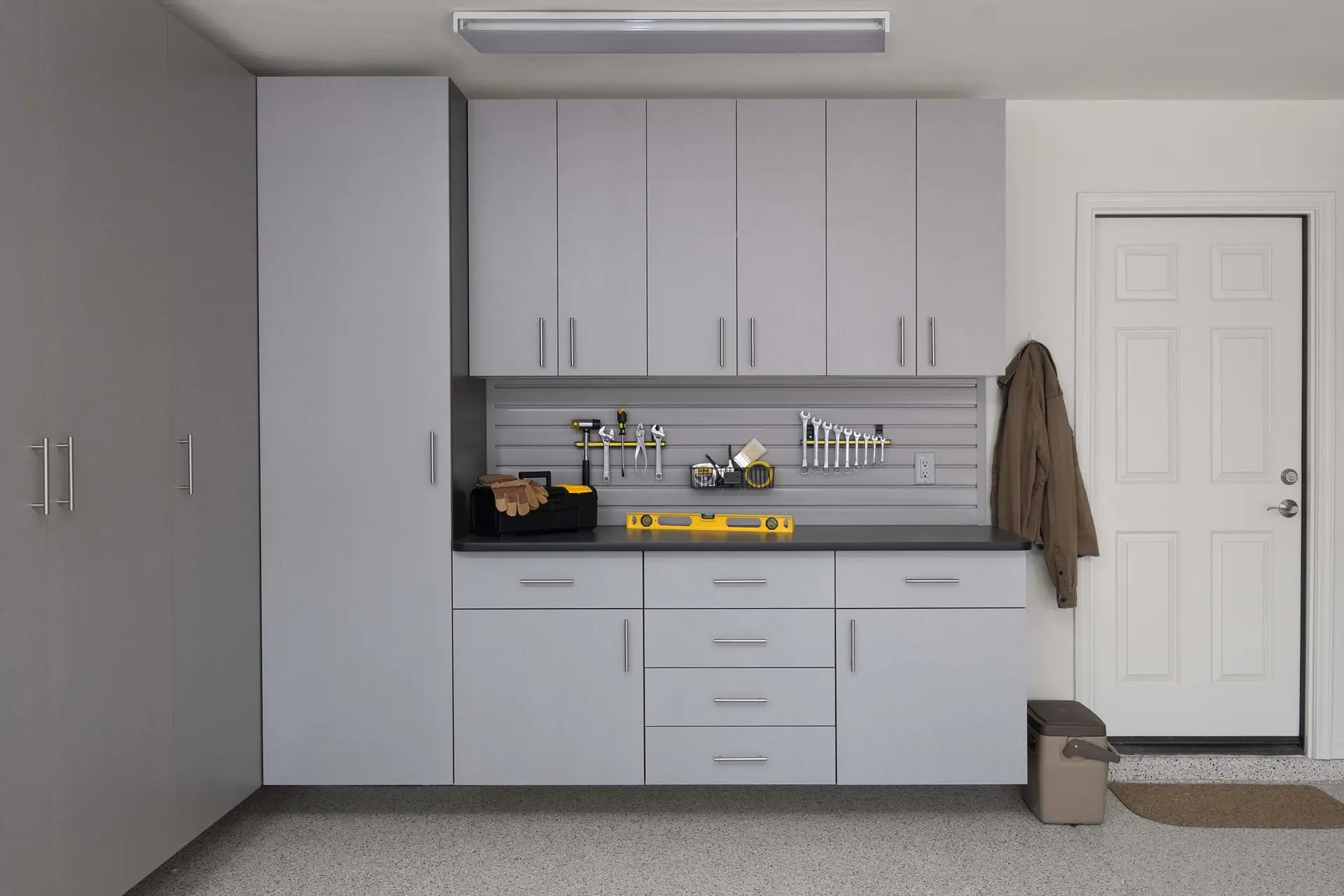 Sleek silver modular garage cabinets installed for a client in Boynton Beach