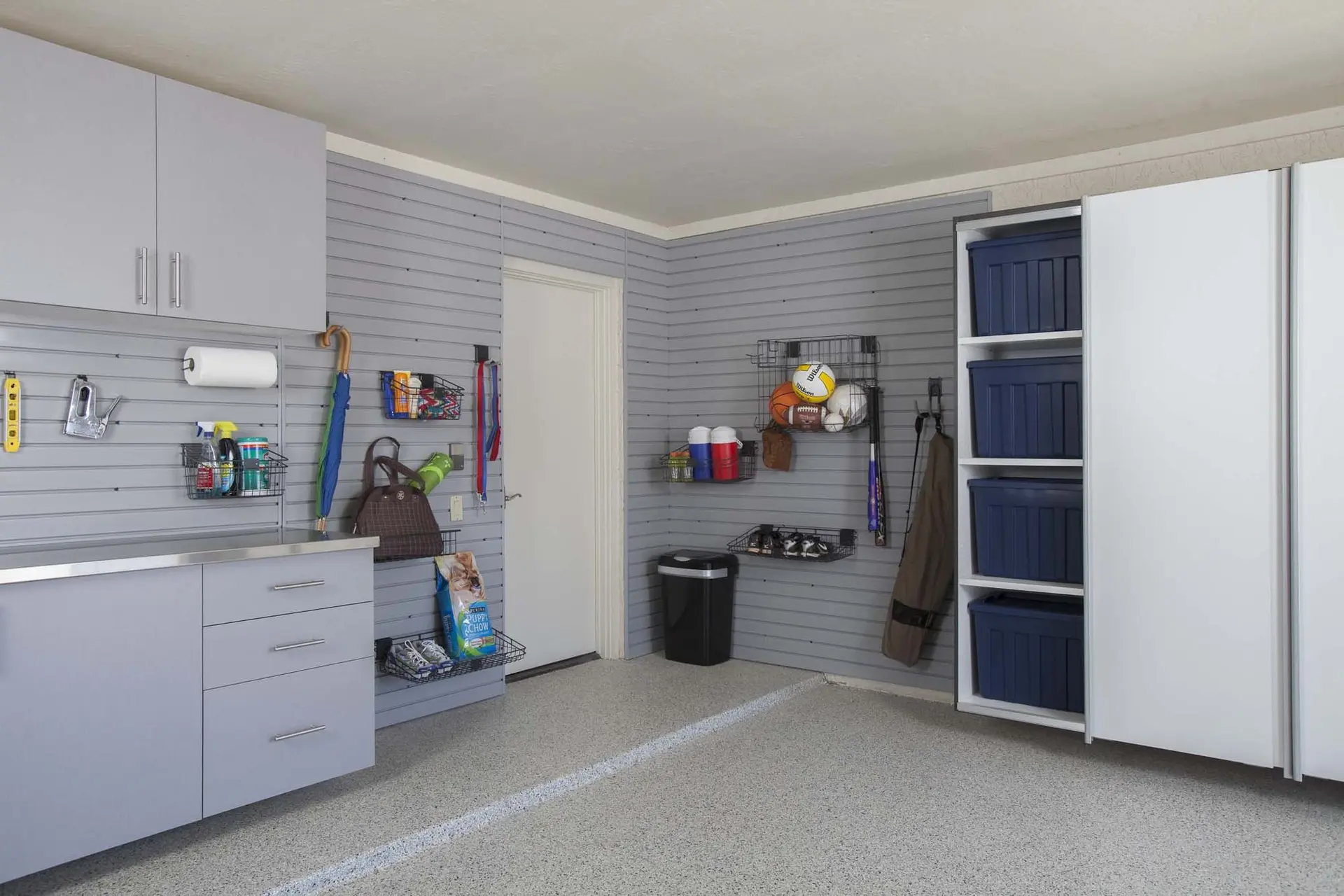 Tall silver garage cabinets providing large capacity home storage