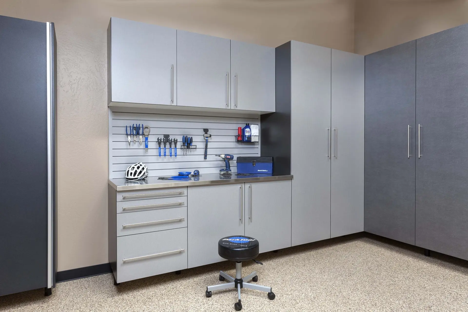 Custom silver garage cabinets and organization systems in Delray Beach