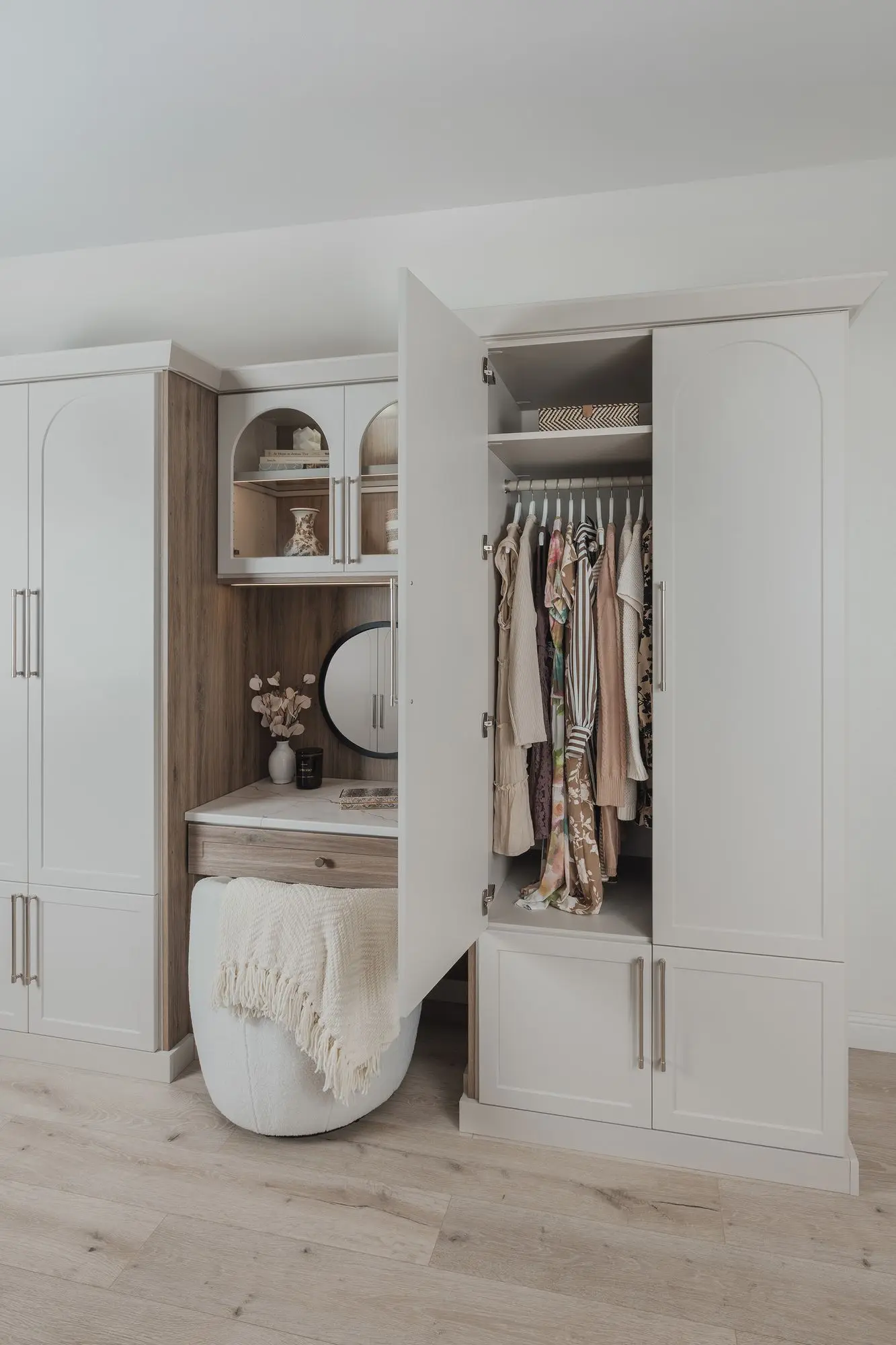 Close up of premium pull out storage drawers and hardware inside a custom closet