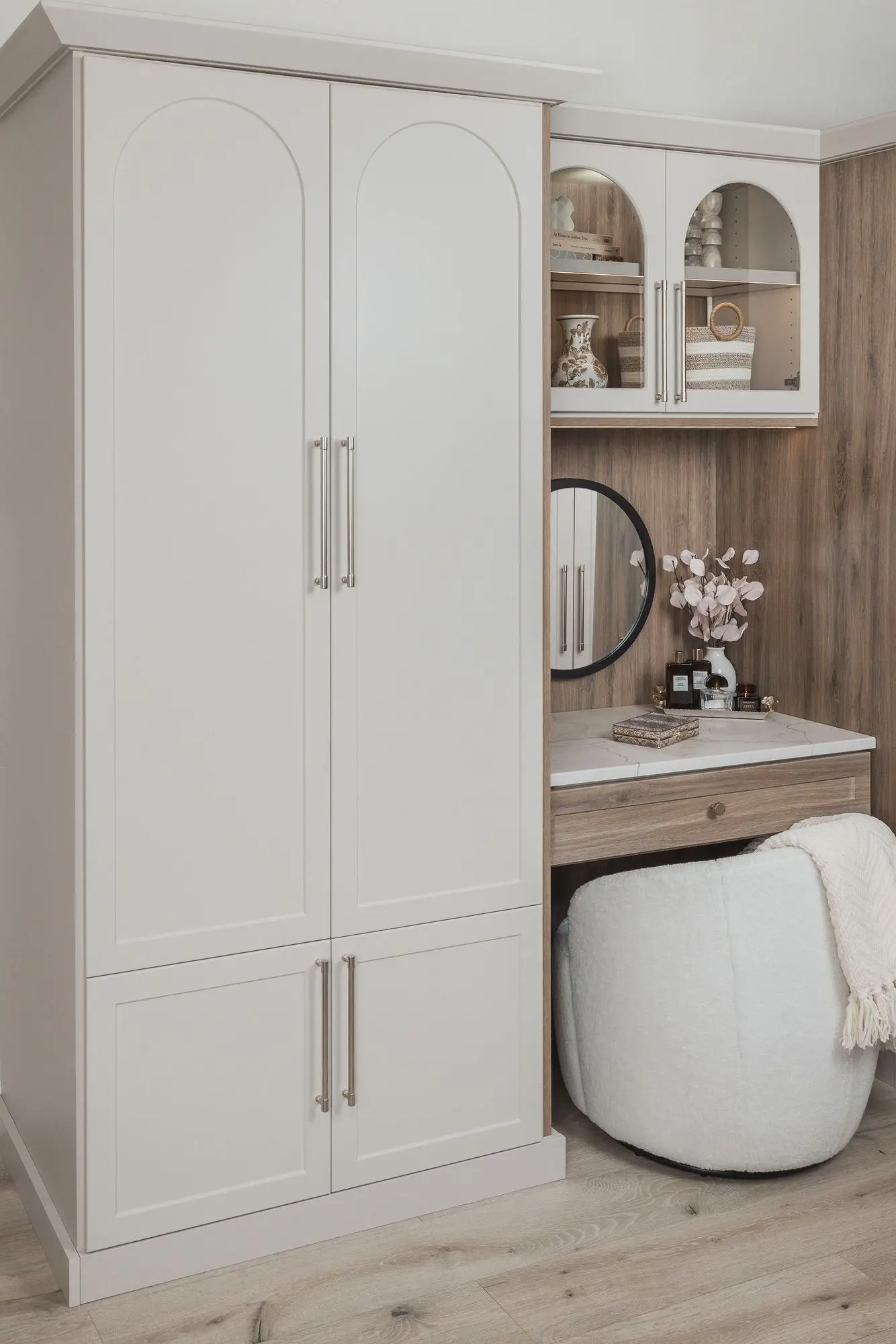 Built in wardrobe closet design with vintage arch details in Boca Raton