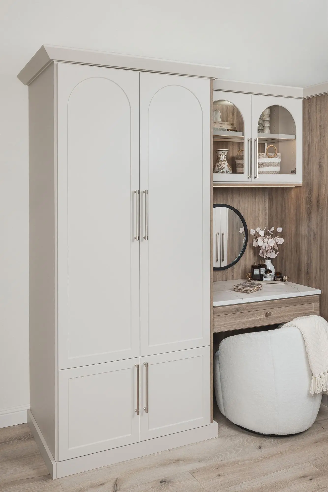 Elegant white and drift finish wardrobe closet featuring spacious open shelving