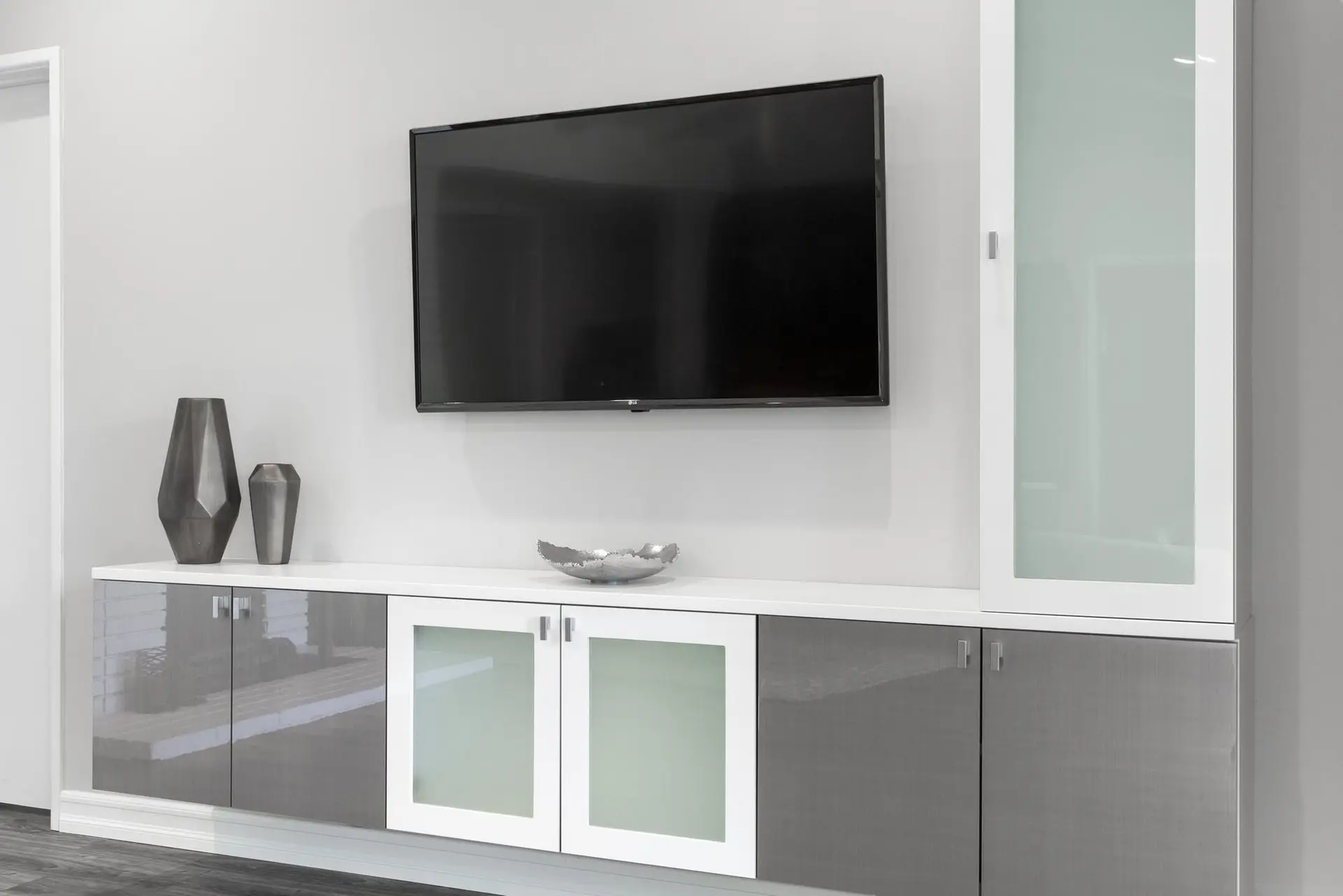 High end custom entertainment centers Boca Raton FL installation with minimalist hardware