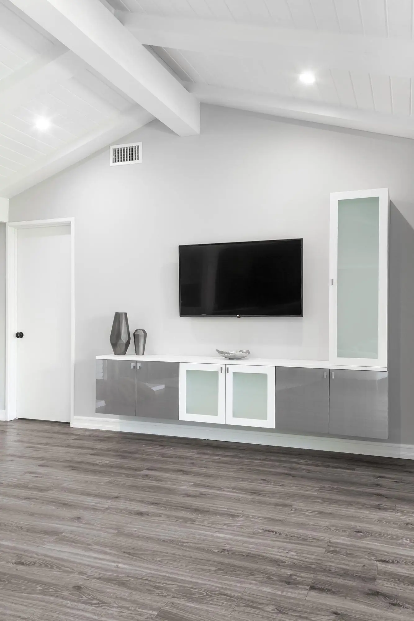 Sleek contemporary custom entertainment centers built by a local contractor in Fort Lauderdale