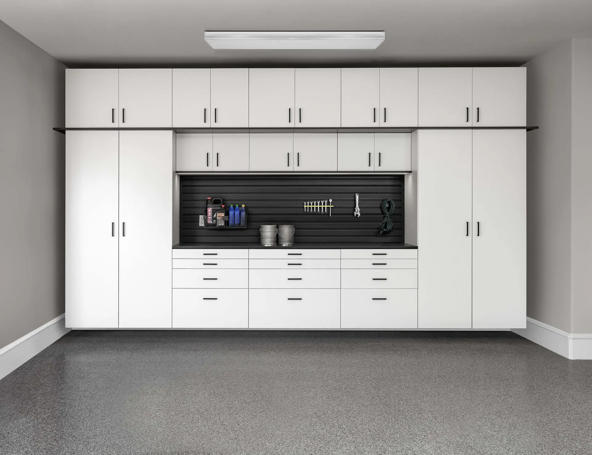 White garage workbench with a heavy duty tool organization system near me