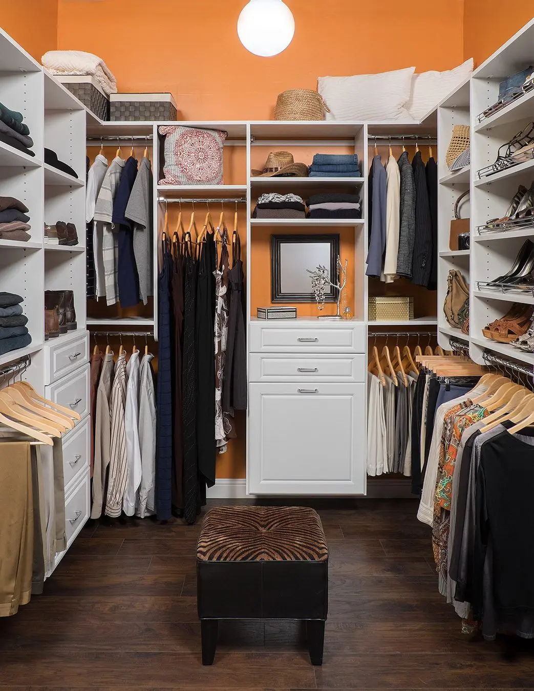 Bespoke boutique walk-in closet organizer system maximizing master suite apparel storage