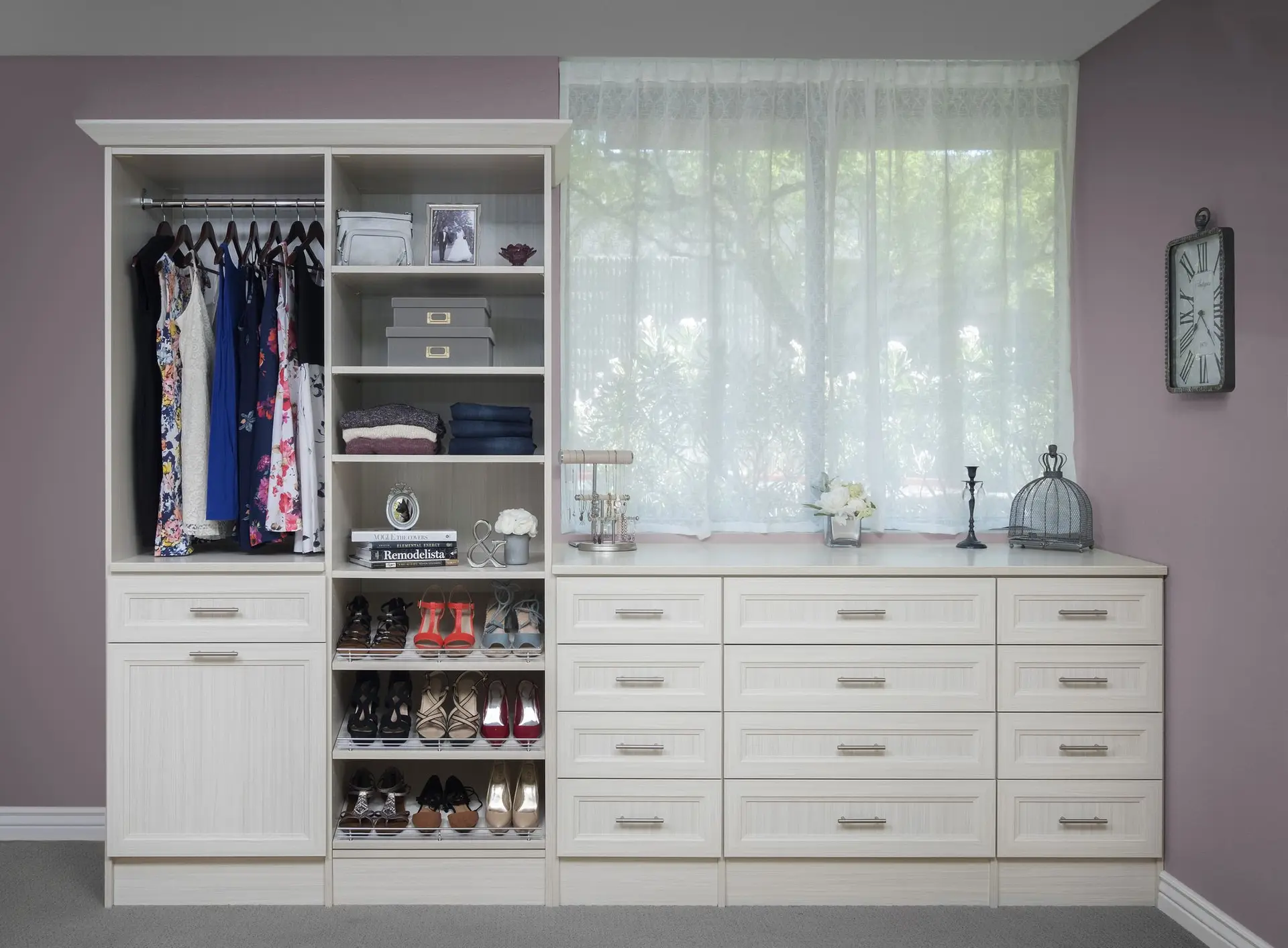 Built in wardrobe closet design featuring spacious hanging rods and modern drawer storage